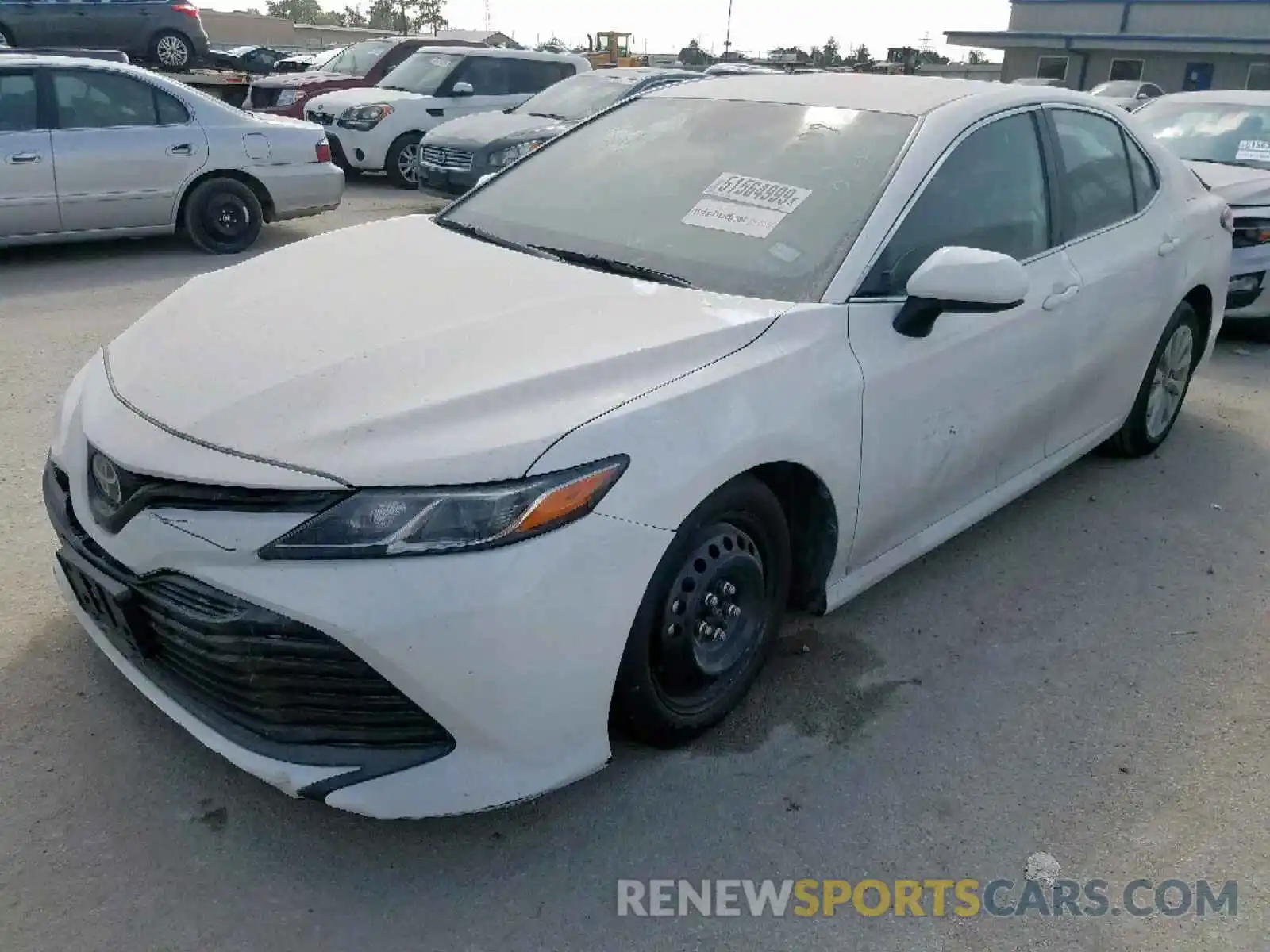 2 Photograph of a damaged car 4T1B11HK6KU194168 TOYOTA CAMRY 2019