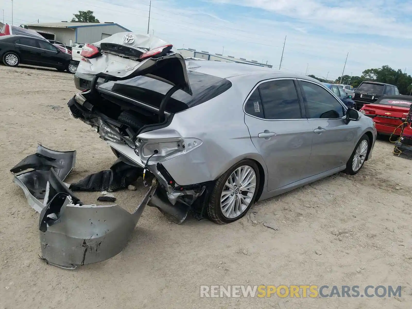 4 Photograph of a damaged car 4T1B11HK6KU197393 TOYOTA CAMRY 2019