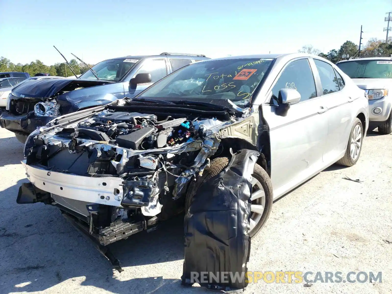 2 Photograph of a damaged car 4T1B11HK6KU199757 TOYOTA CAMRY 2019