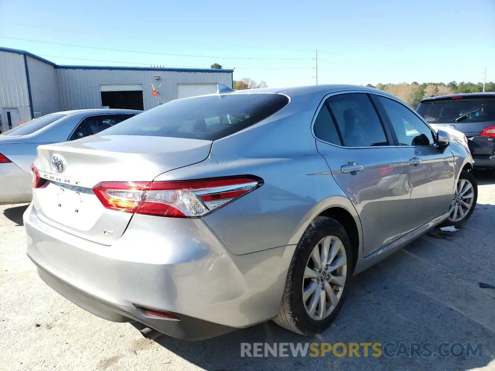 4 Photograph of a damaged car 4T1B11HK6KU199757 TOYOTA CAMRY 2019