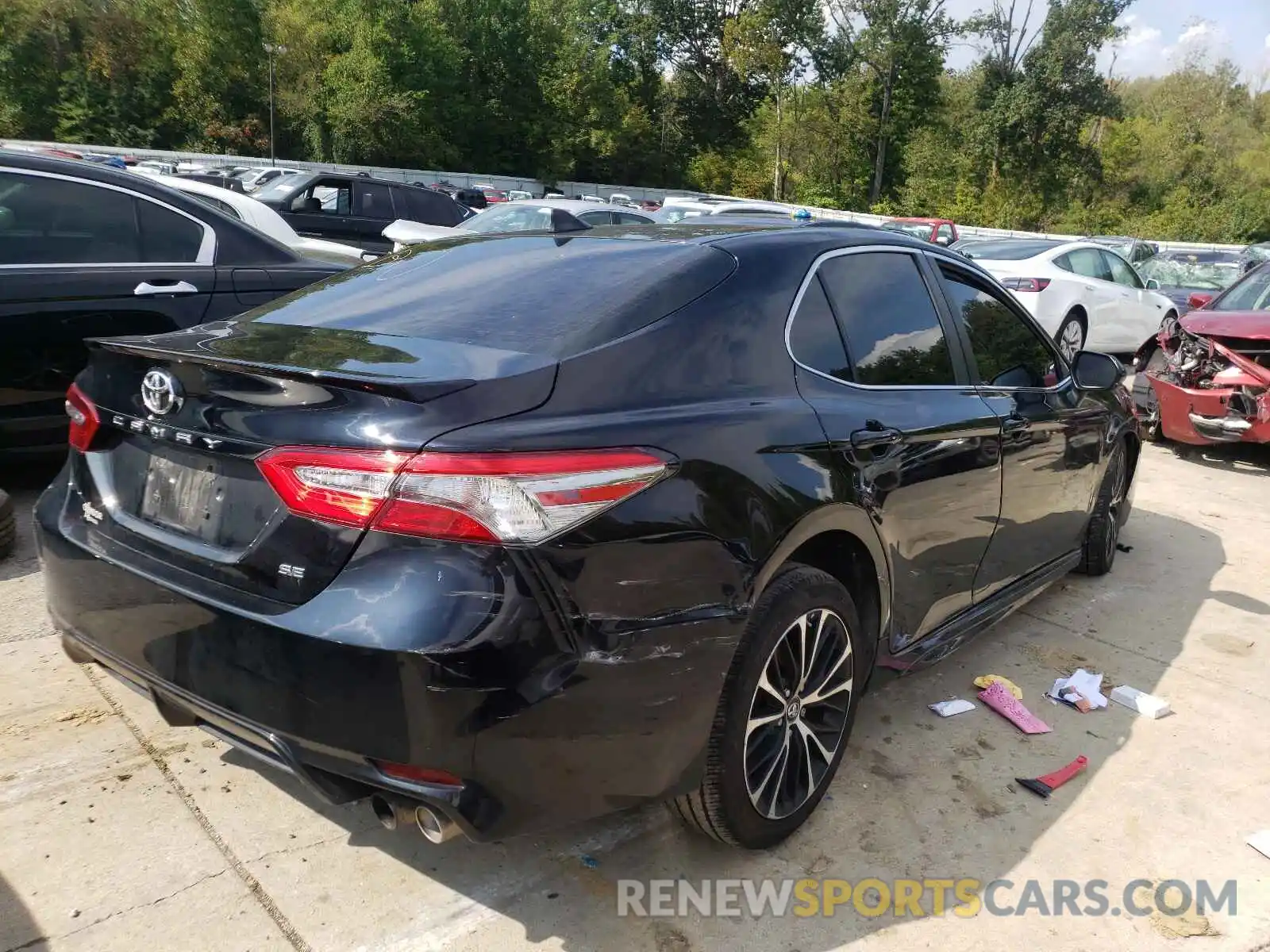 4 Photograph of a damaged car 4T1B11HK6KU200857 TOYOTA CAMRY 2019