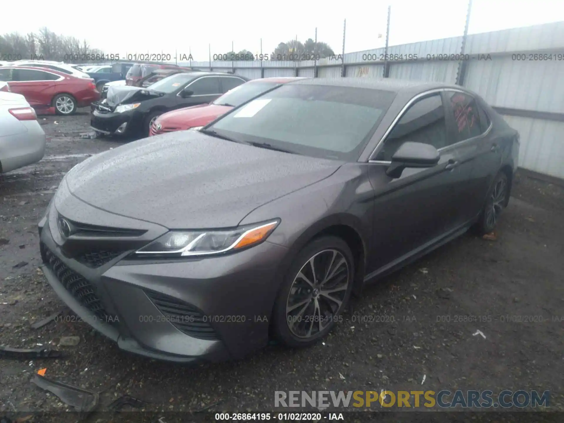 2 Photograph of a damaged car 4T1B11HK6KU201054 TOYOTA CAMRY 2019