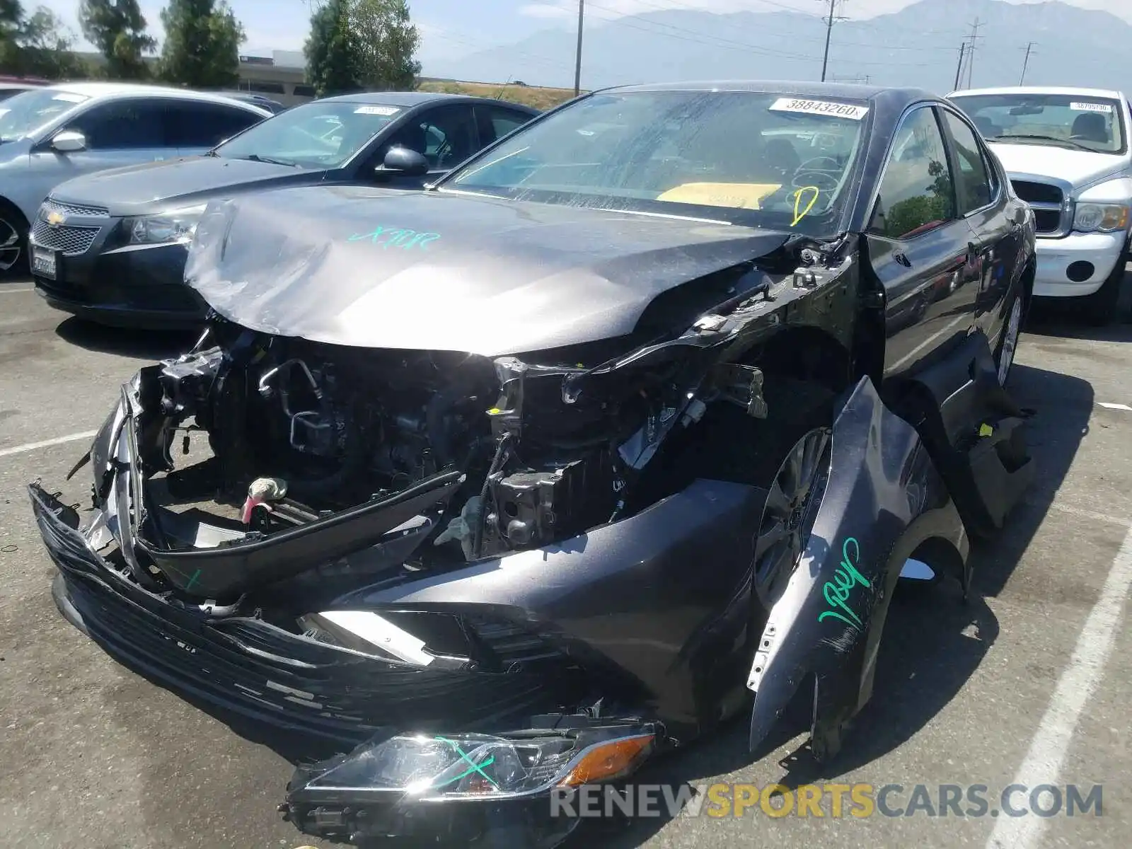 2 Photograph of a damaged car 4T1B11HK6KU201085 TOYOTA CAMRY 2019