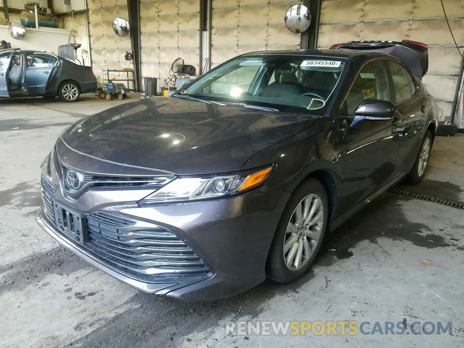 2 Photograph of a damaged car 4T1B11HK6KU208232 TOYOTA CAMRY 2019