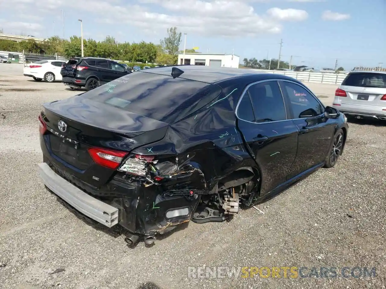 4 Photograph of a damaged car 4T1B11HK6KU209302 TOYOTA CAMRY 2019