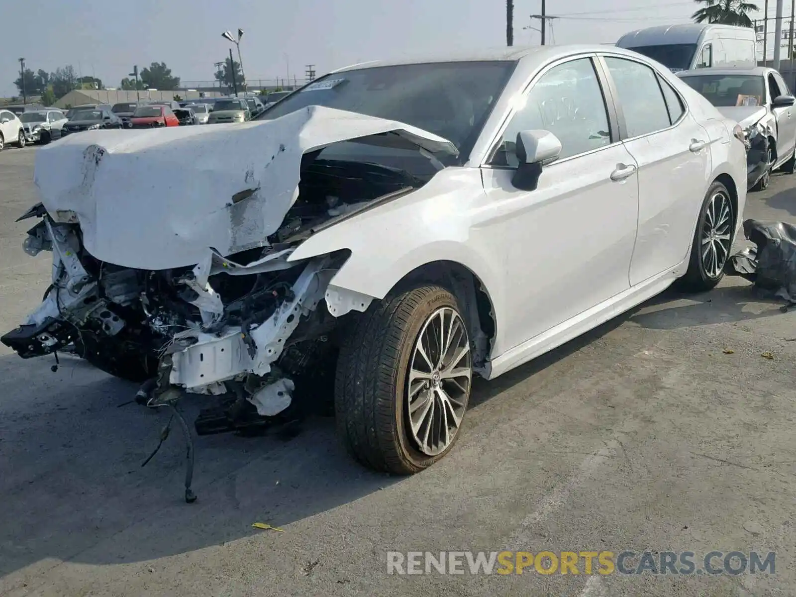 2 Photograph of a damaged car 4T1B11HK6KU209736 TOYOTA CAMRY 2019