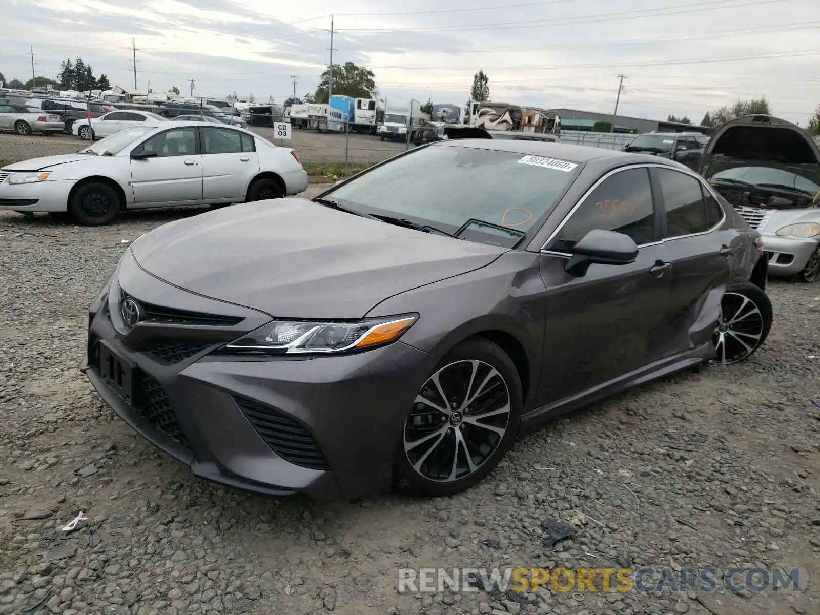 2 Photograph of a damaged car 4T1B11HK6KU211535 TOYOTA CAMRY 2019