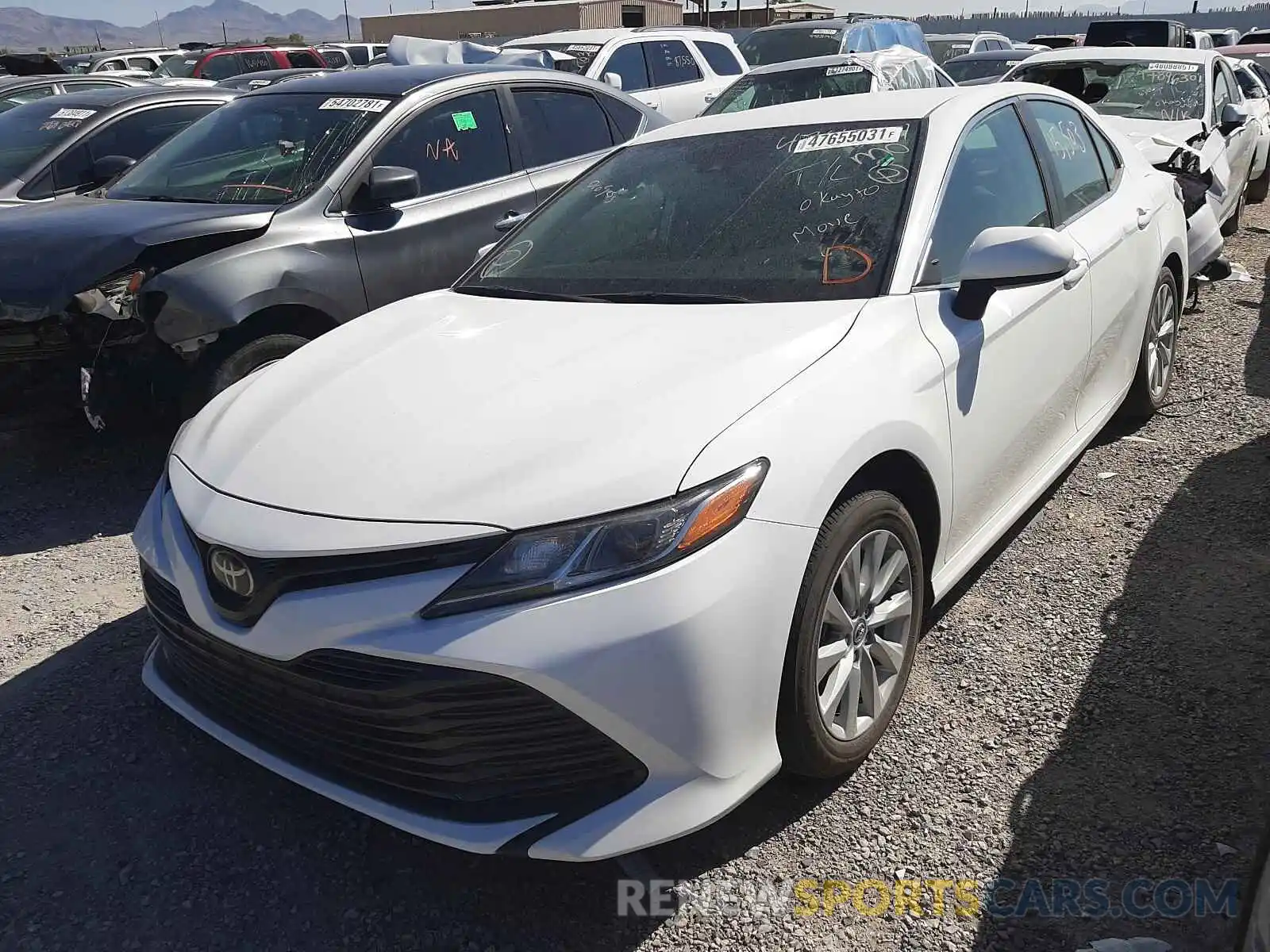 2 Photograph of a damaged car 4T1B11HK6KU211616 TOYOTA CAMRY 2019