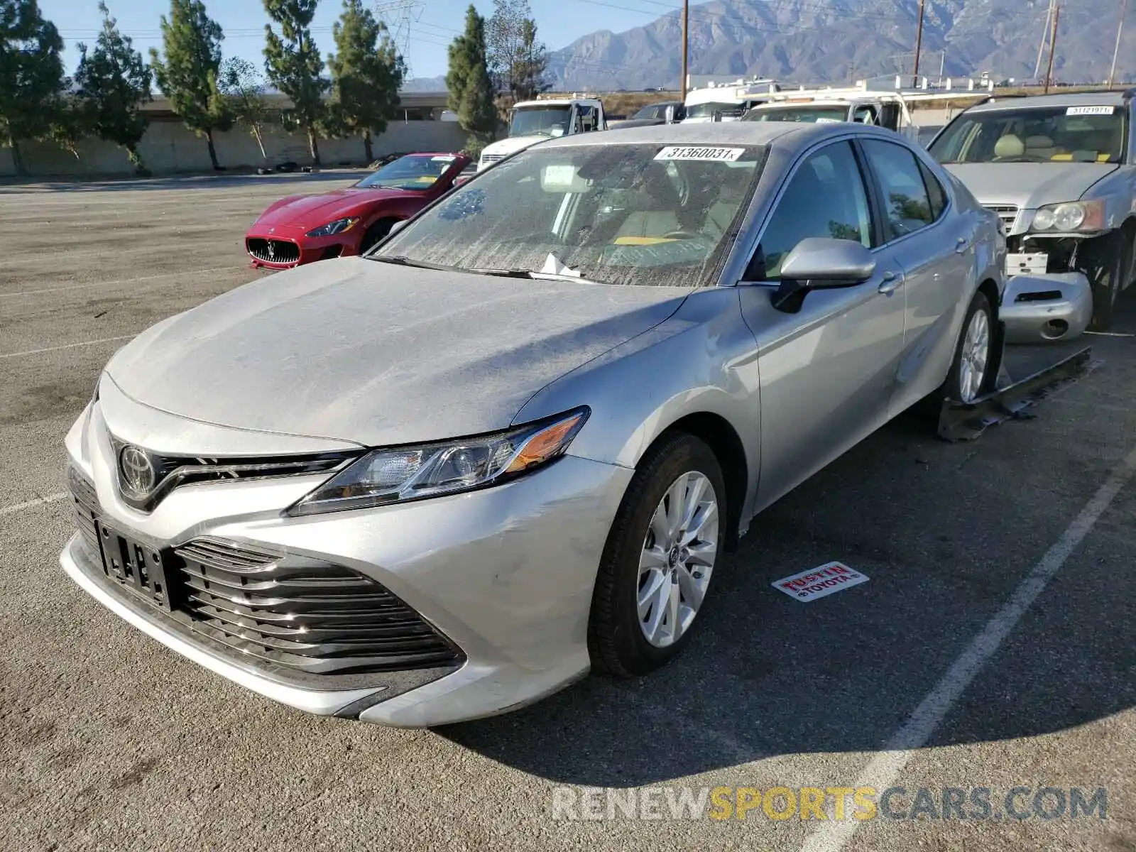 2 Photograph of a damaged car 4T1B11HK6KU213933 TOYOTA CAMRY 2019