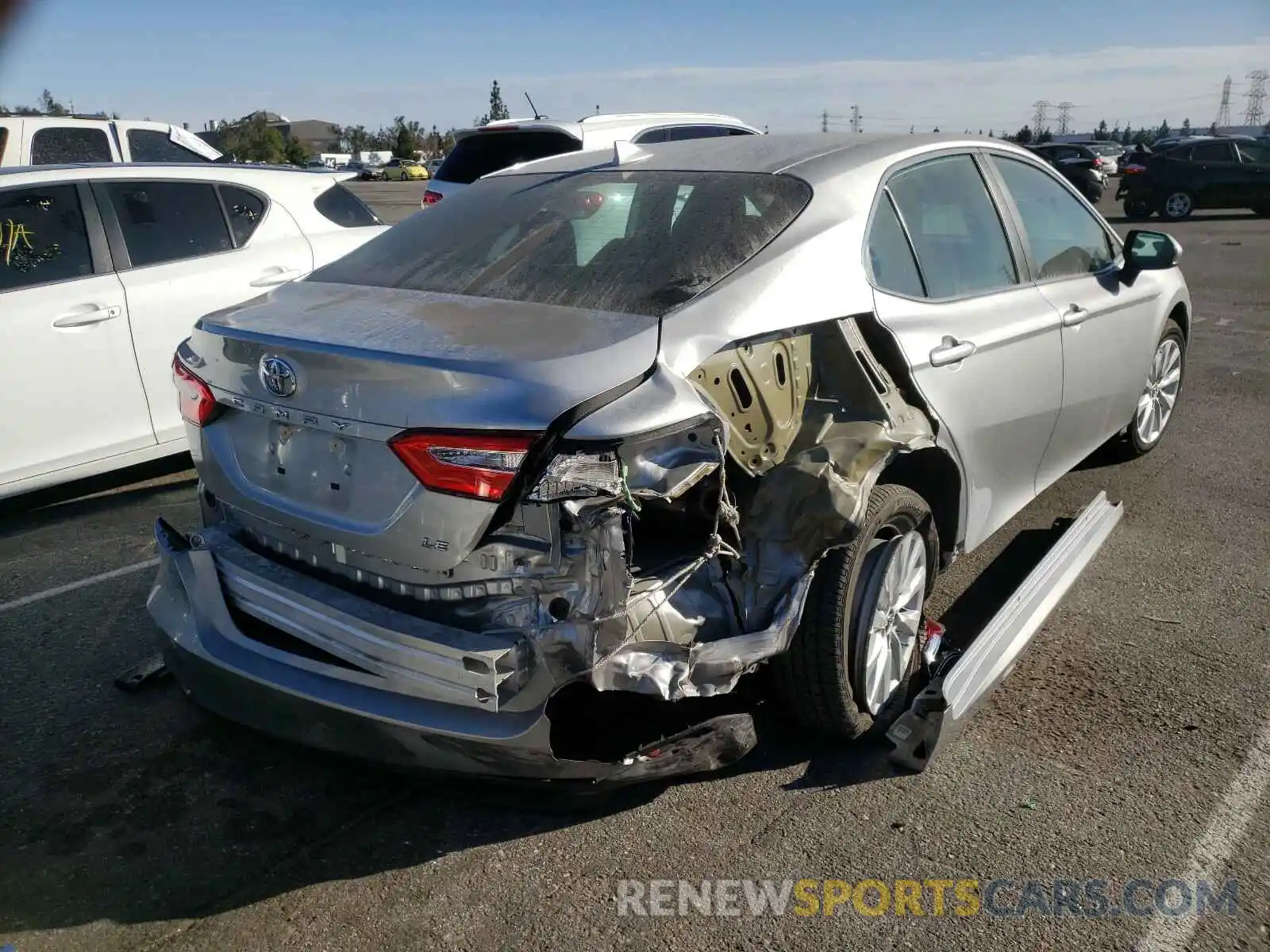 4 Photograph of a damaged car 4T1B11HK6KU213933 TOYOTA CAMRY 2019