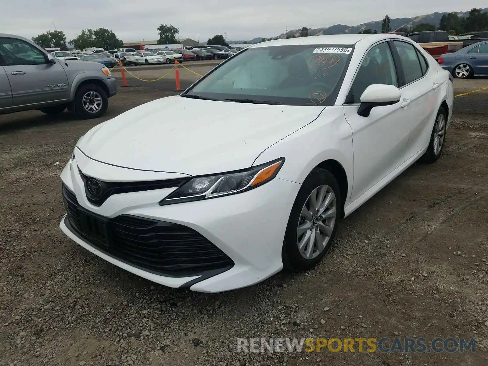 2 Photograph of a damaged car 4T1B11HK6KU220087 TOYOTA CAMRY 2019