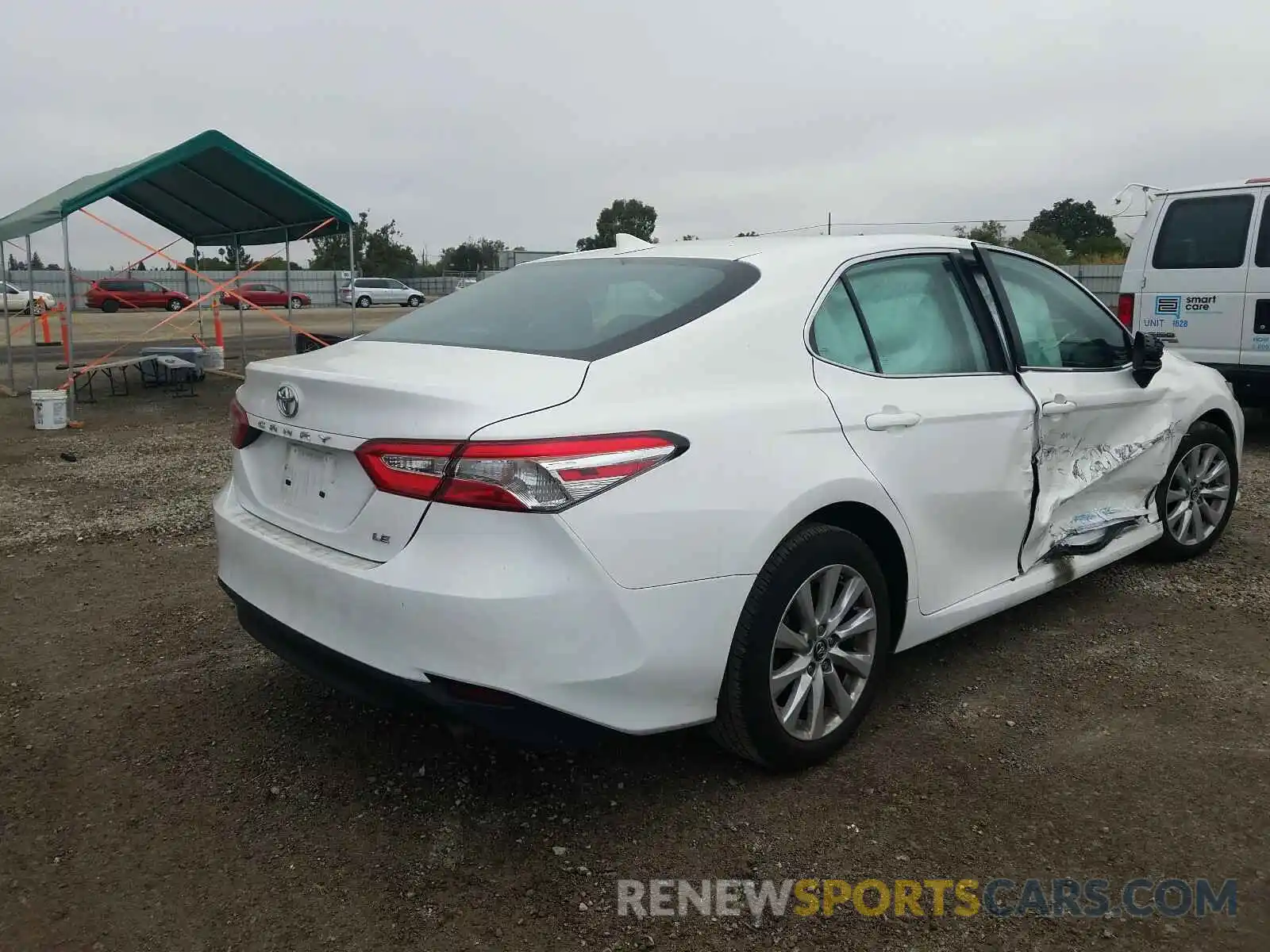 4 Photograph of a damaged car 4T1B11HK6KU220087 TOYOTA CAMRY 2019