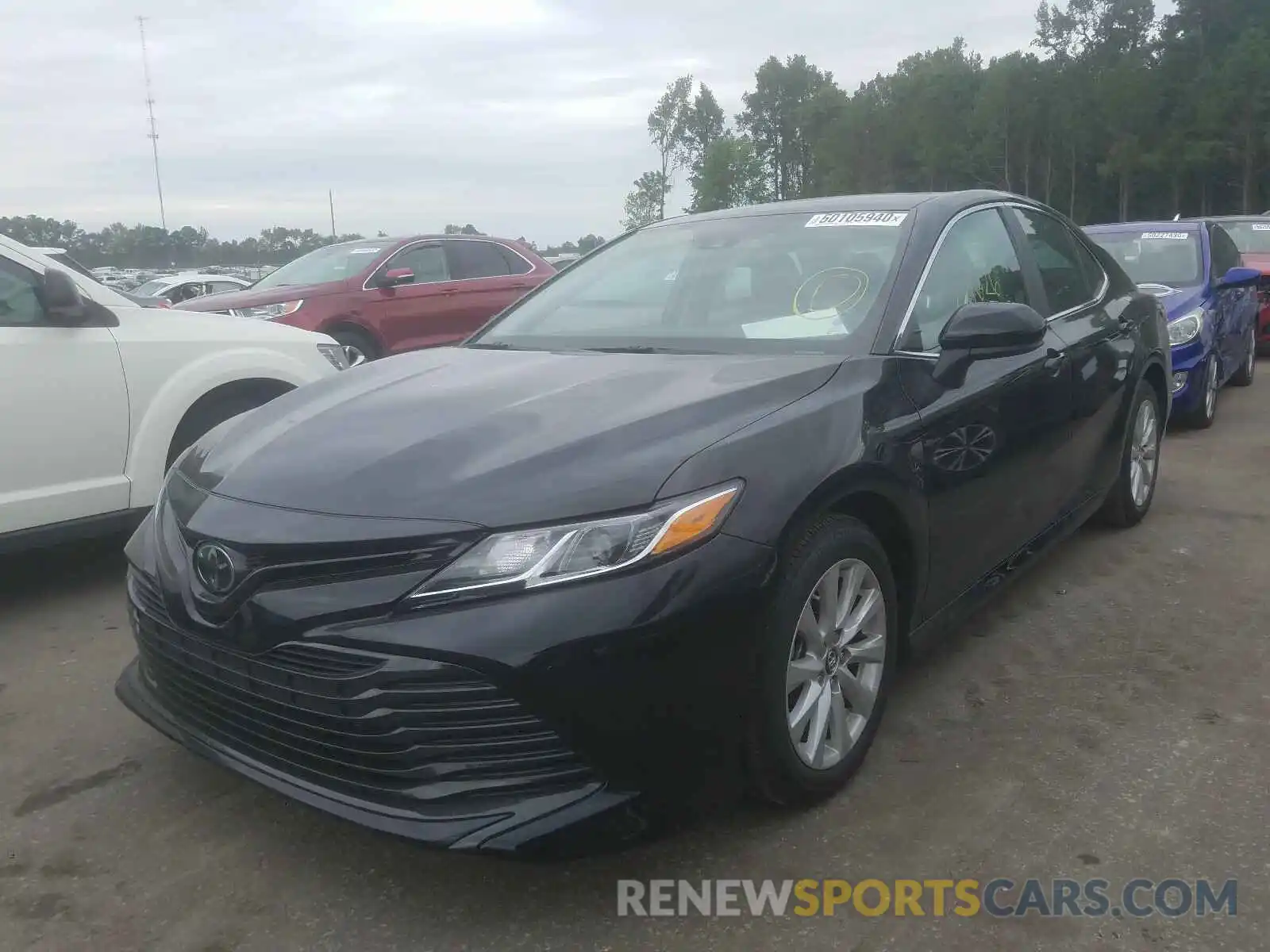 2 Photograph of a damaged car 4T1B11HK6KU225077 TOYOTA CAMRY 2019