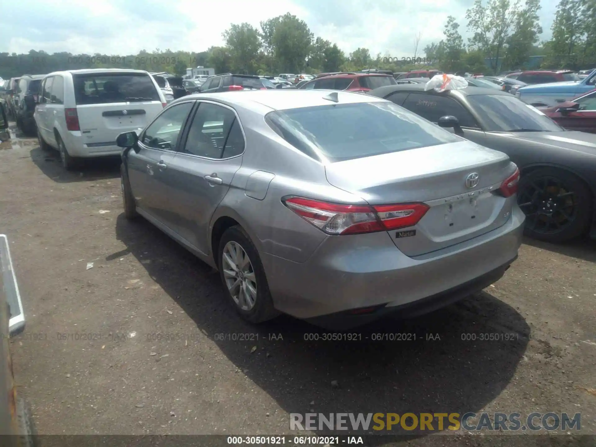 3 Photograph of a damaged car 4T1B11HK6KU230523 TOYOTA CAMRY 2019