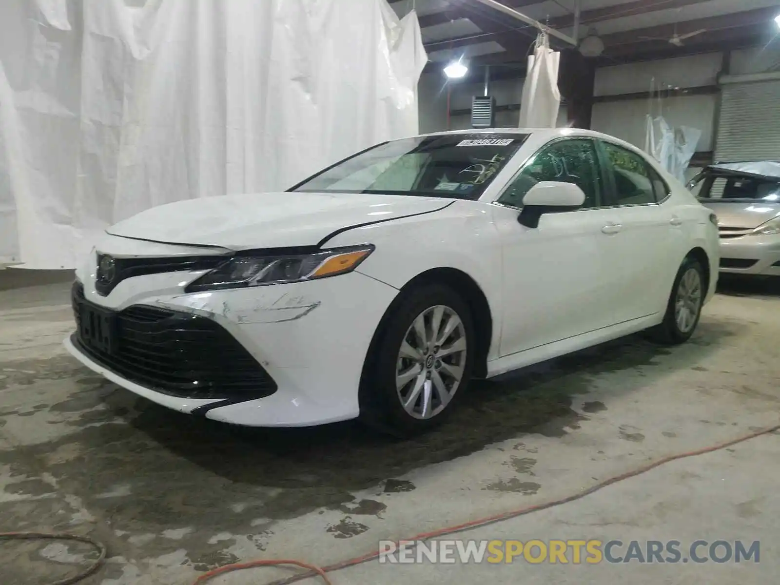 2 Photograph of a damaged car 4T1B11HK6KU230828 TOYOTA CAMRY 2019