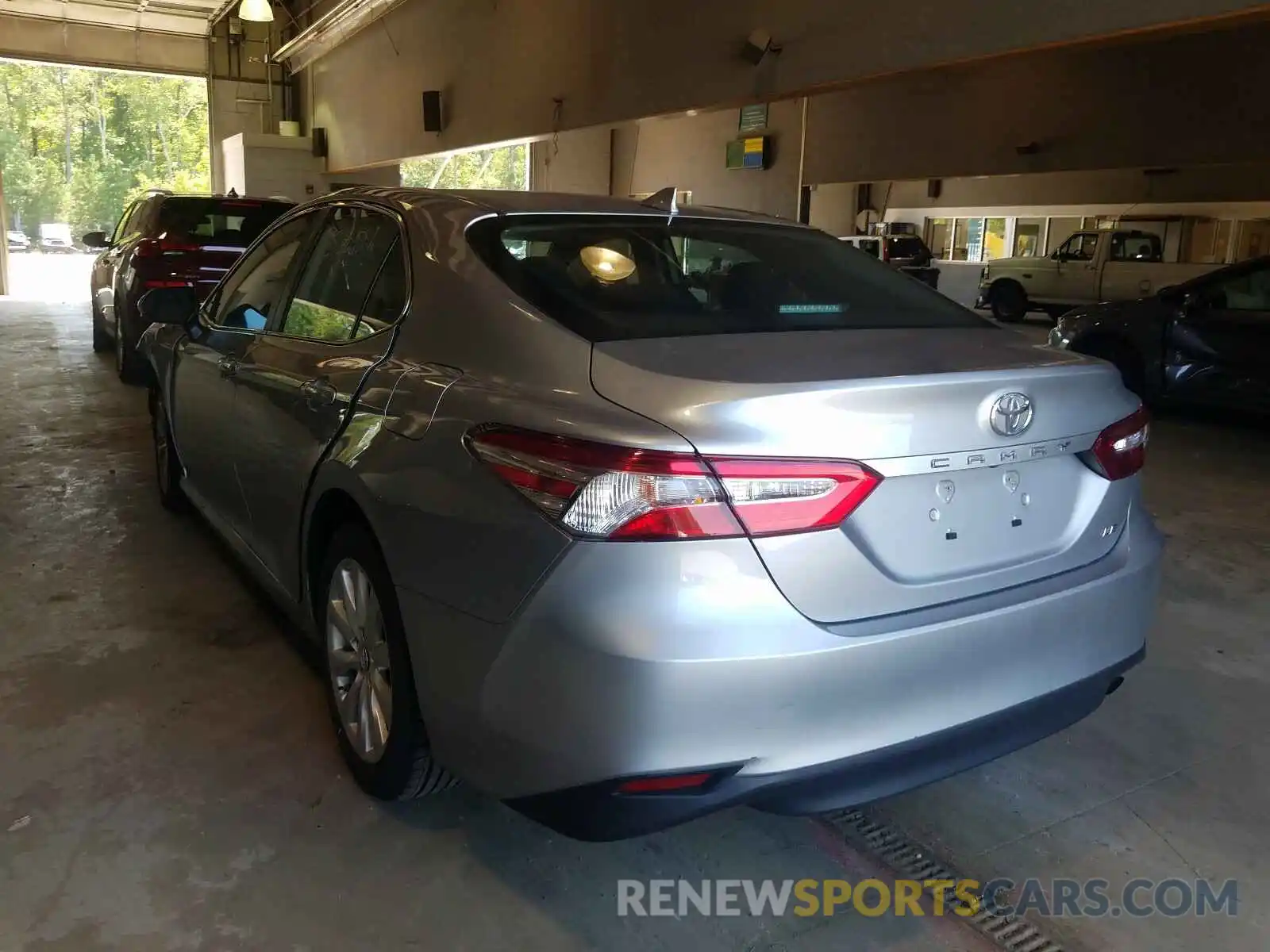 3 Photograph of a damaged car 4T1B11HK6KU230943 TOYOTA CAMRY 2019