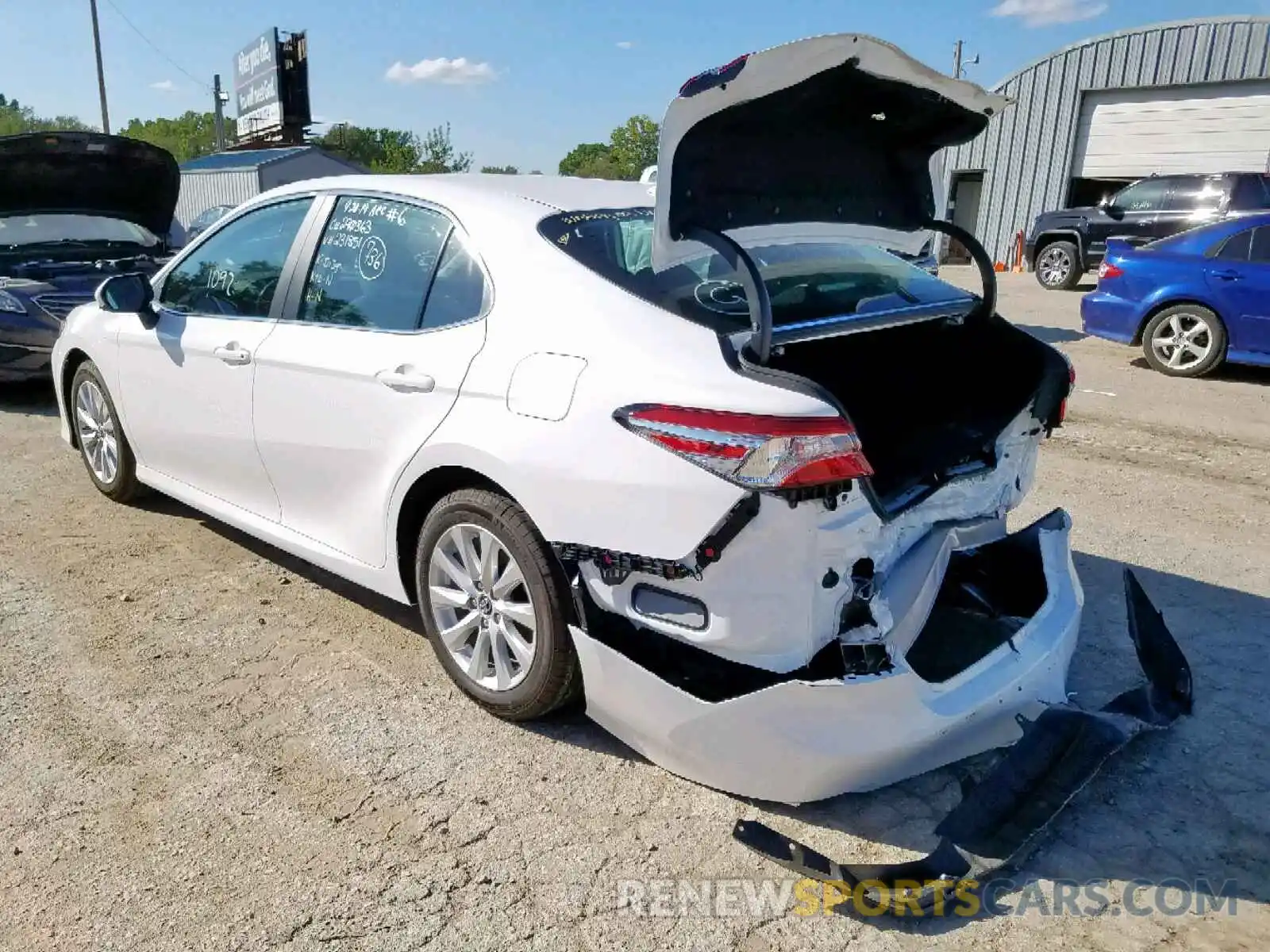 3 Photograph of a damaged car 4T1B11HK6KU231851 TOYOTA CAMRY 2019