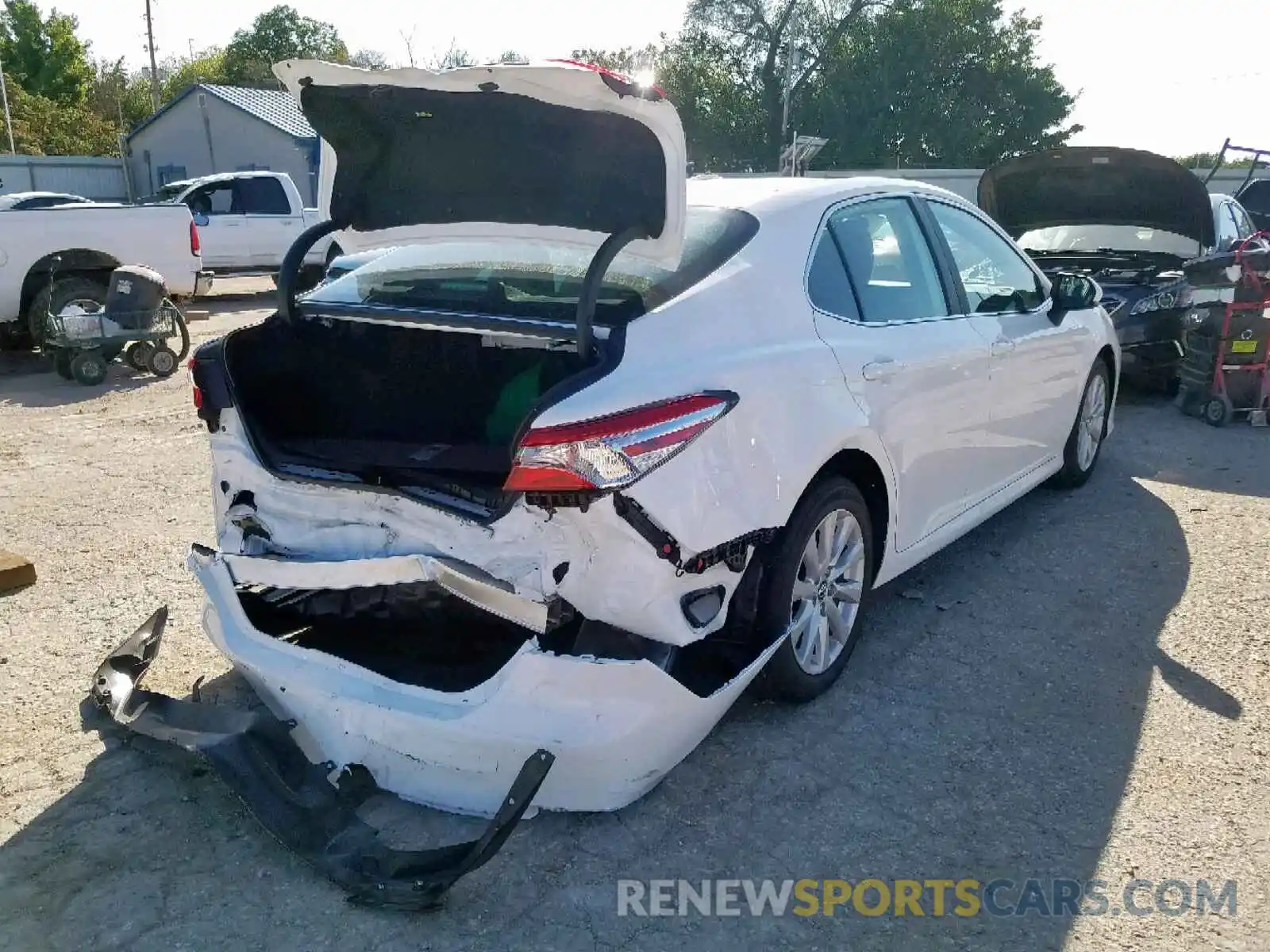 4 Photograph of a damaged car 4T1B11HK6KU231851 TOYOTA CAMRY 2019