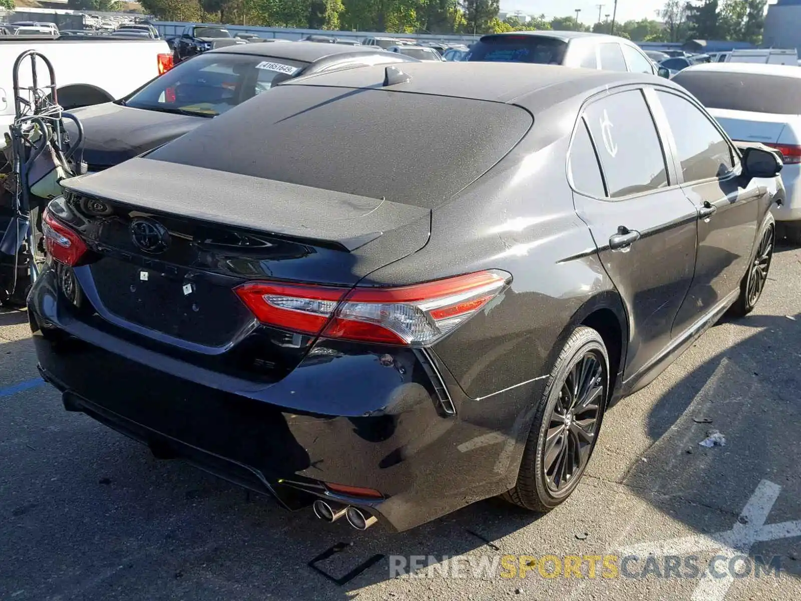 4 Photograph of a damaged car 4T1B11HK6KU233597 TOYOTA CAMRY 2019