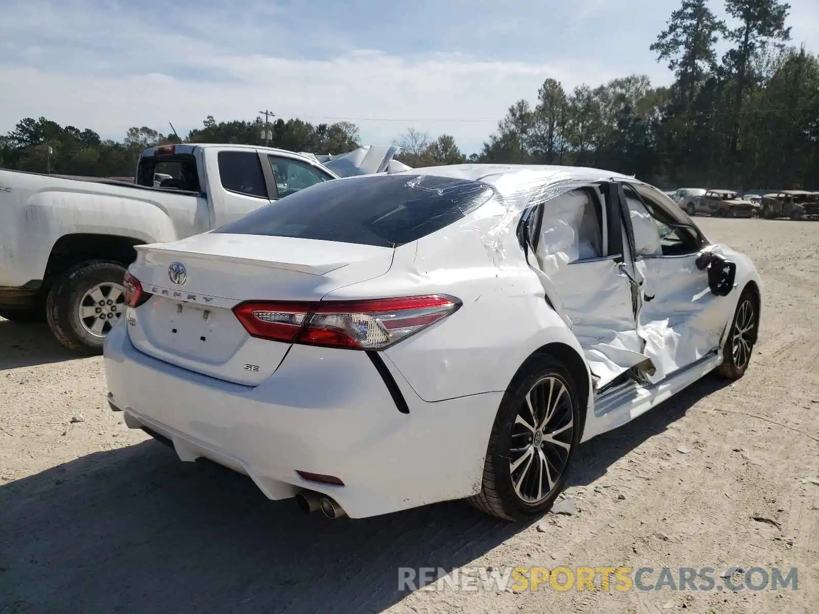 4 Photograph of a damaged car 4T1B11HK6KU233714 TOYOTA CAMRY 2019