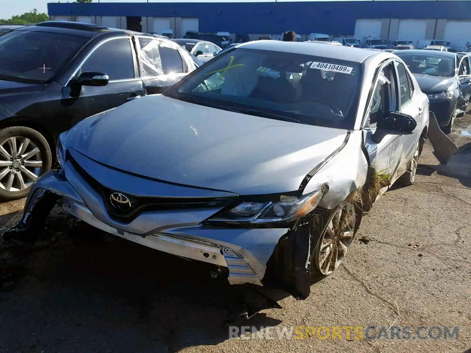 2 Photograph of a damaged car 4T1B11HK6KU238668 TOYOTA CAMRY 2019