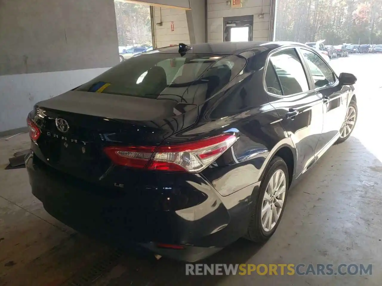 4 Photograph of a damaged car 4T1B11HK6KU240016 TOYOTA CAMRY 2019