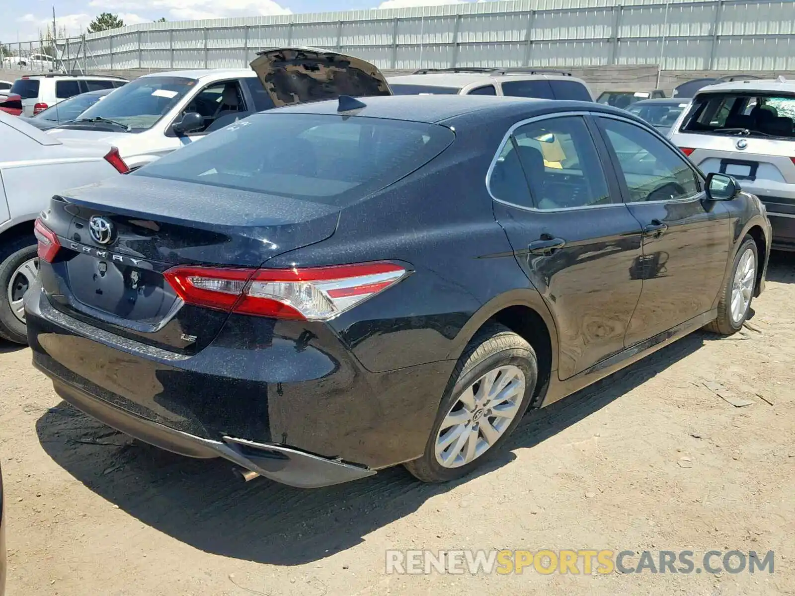 4 Photograph of a damaged car 4T1B11HK6KU240095 TOYOTA CAMRY 2019