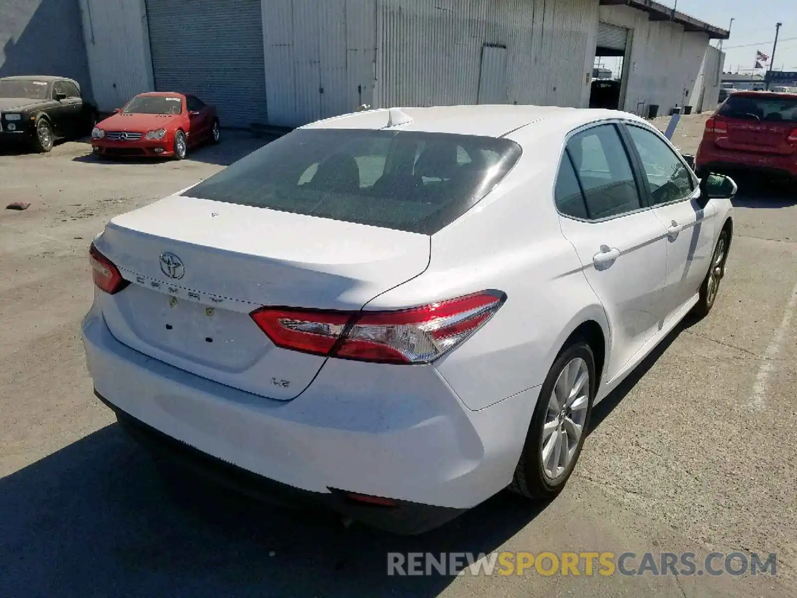 4 Photograph of a damaged car 4T1B11HK6KU240453 TOYOTA CAMRY 2019