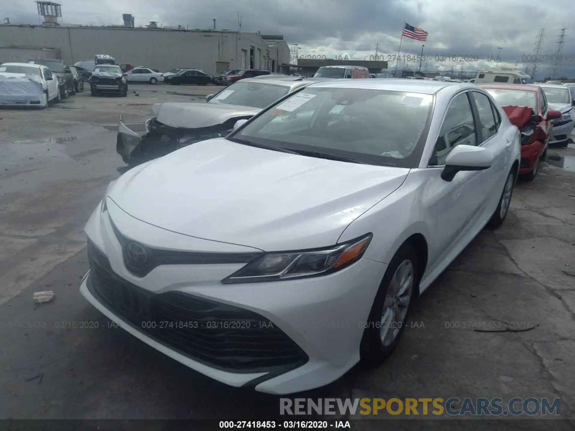 2 Photograph of a damaged car 4T1B11HK6KU242235 TOYOTA CAMRY 2019