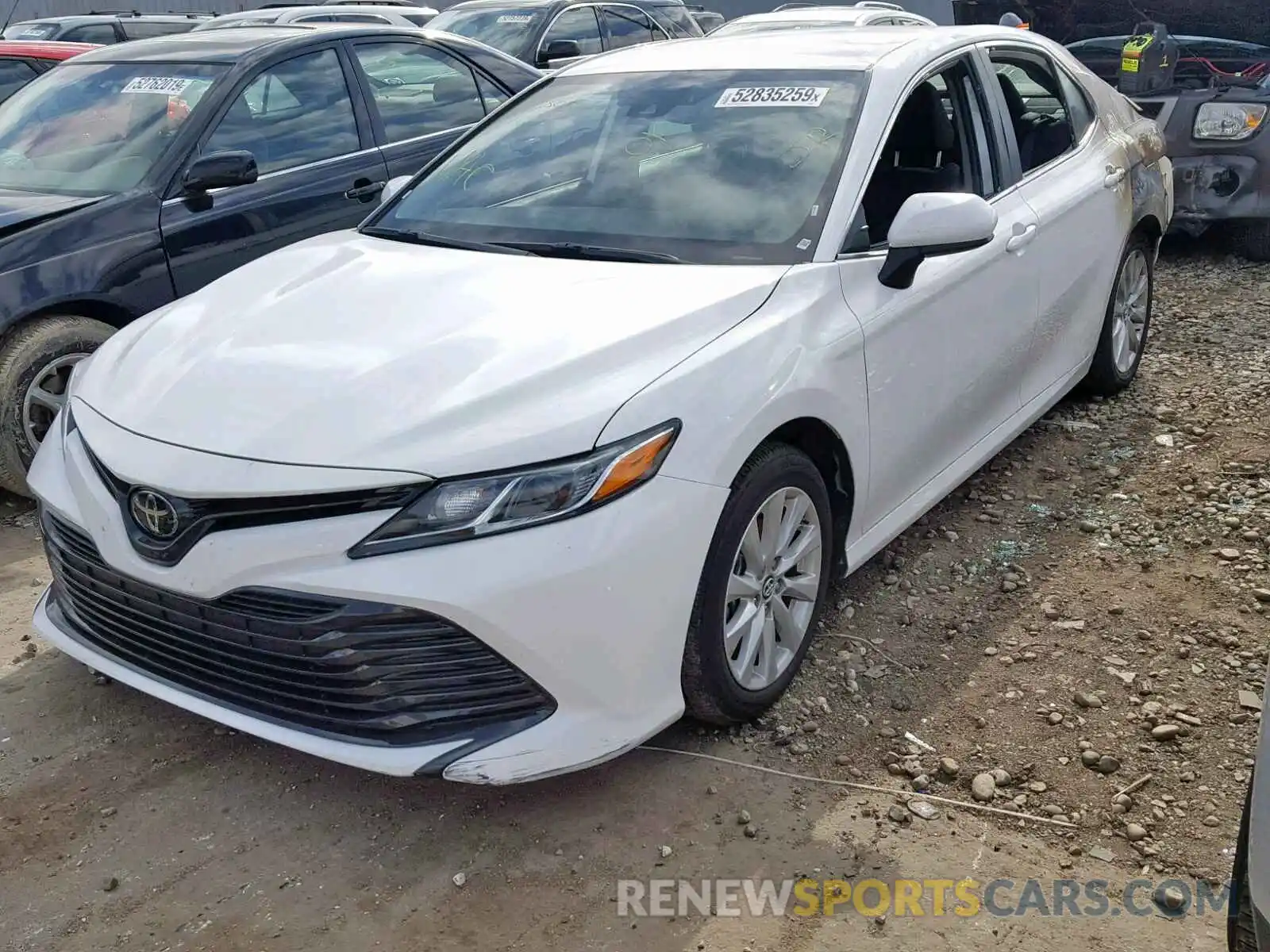 2 Photograph of a damaged car 4T1B11HK6KU242560 TOYOTA CAMRY 2019