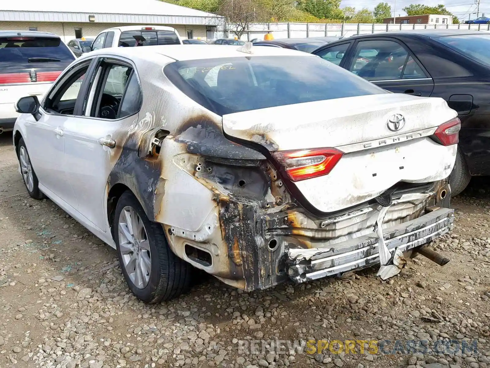 3 Photograph of a damaged car 4T1B11HK6KU242560 TOYOTA CAMRY 2019