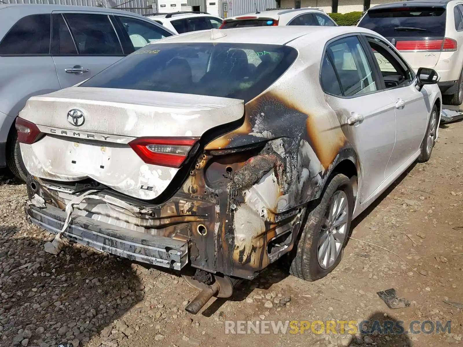 4 Photograph of a damaged car 4T1B11HK6KU242560 TOYOTA CAMRY 2019