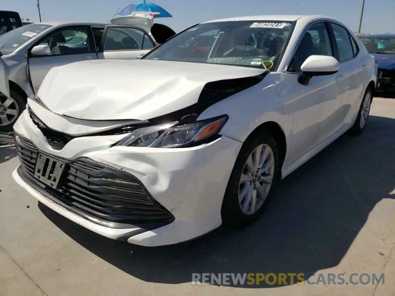 2 Photograph of a damaged car 4T1B11HK6KU242591 TOYOTA CAMRY 2019