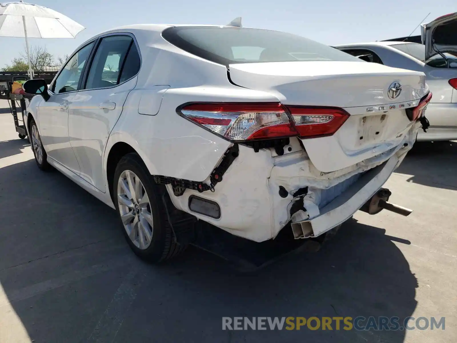 3 Photograph of a damaged car 4T1B11HK6KU242591 TOYOTA CAMRY 2019