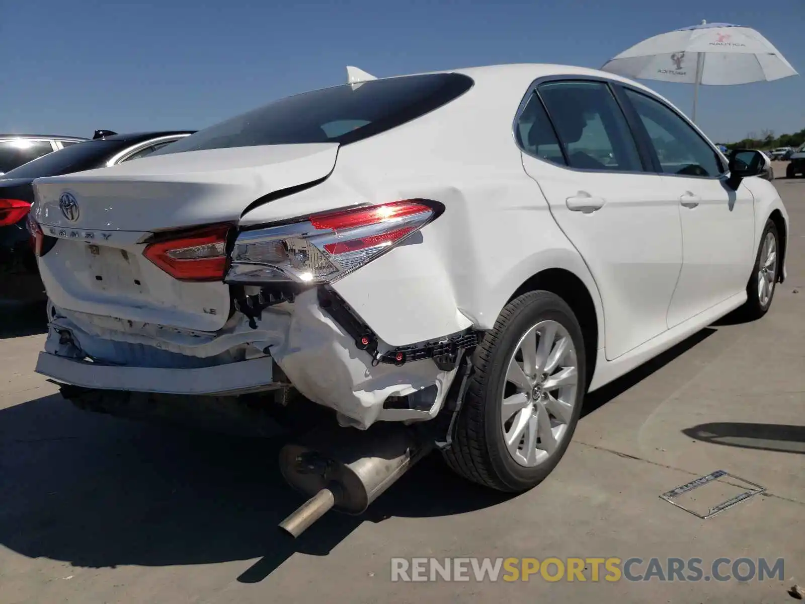 4 Photograph of a damaged car 4T1B11HK6KU242591 TOYOTA CAMRY 2019