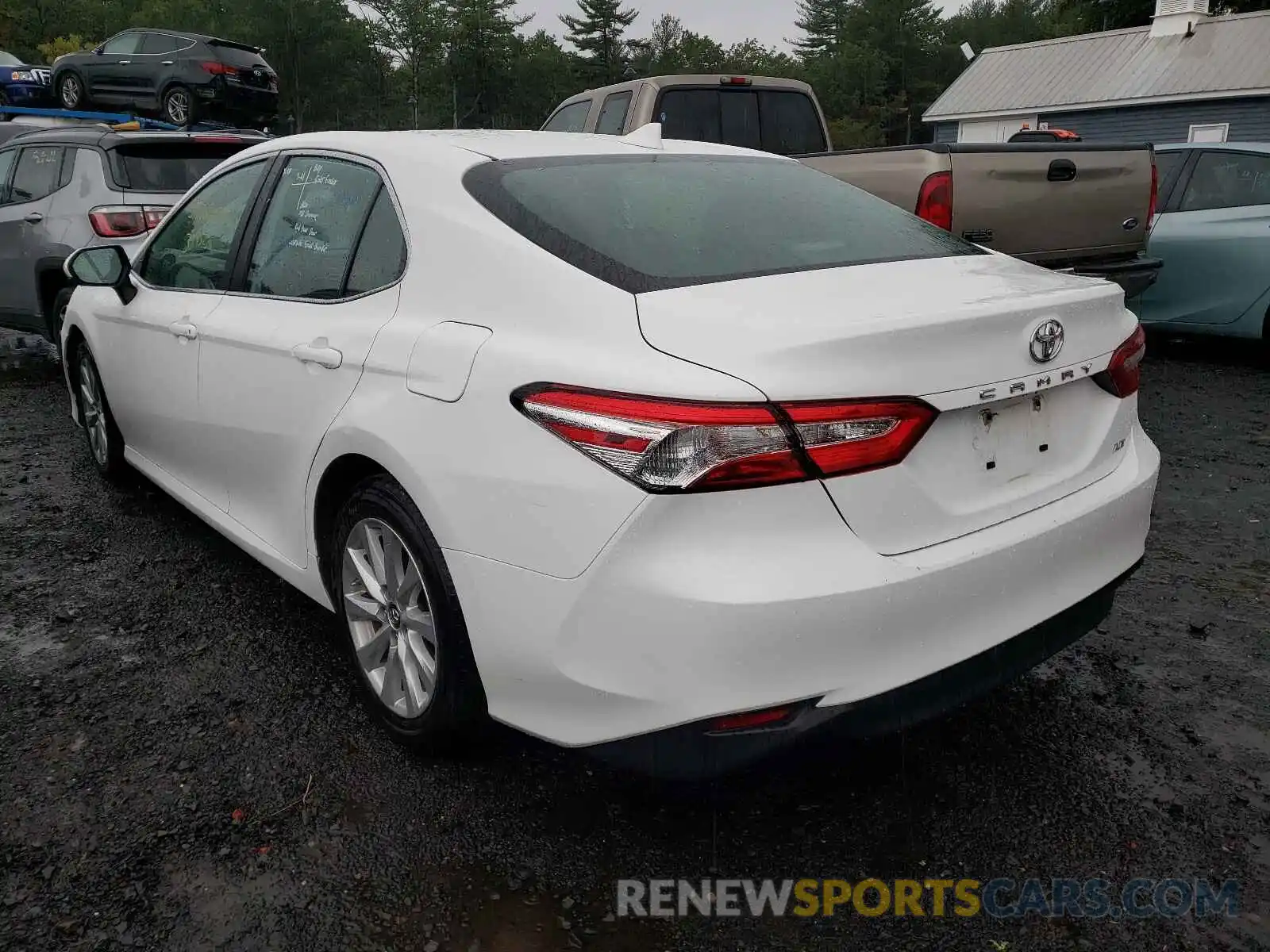 3 Photograph of a damaged car 4T1B11HK6KU242915 TOYOTA CAMRY 2019