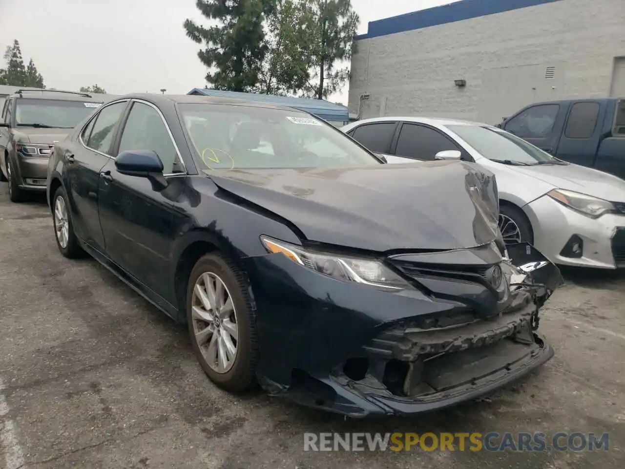 1 Photograph of a damaged car 4T1B11HK6KU243093 TOYOTA CAMRY 2019