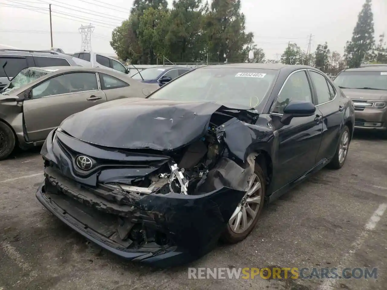 2 Photograph of a damaged car 4T1B11HK6KU243093 TOYOTA CAMRY 2019