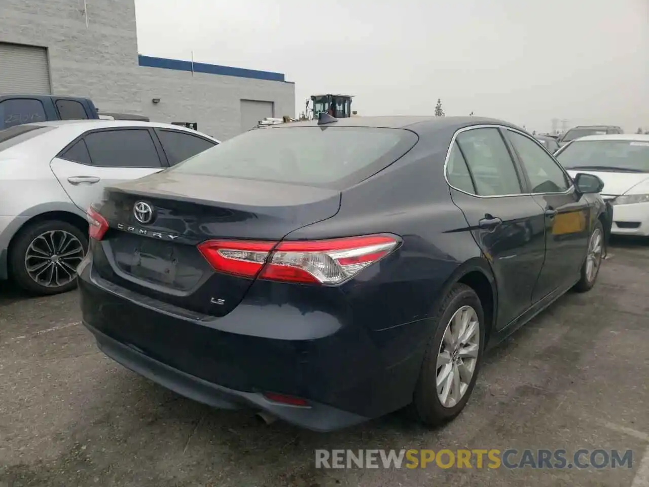 4 Photograph of a damaged car 4T1B11HK6KU243093 TOYOTA CAMRY 2019