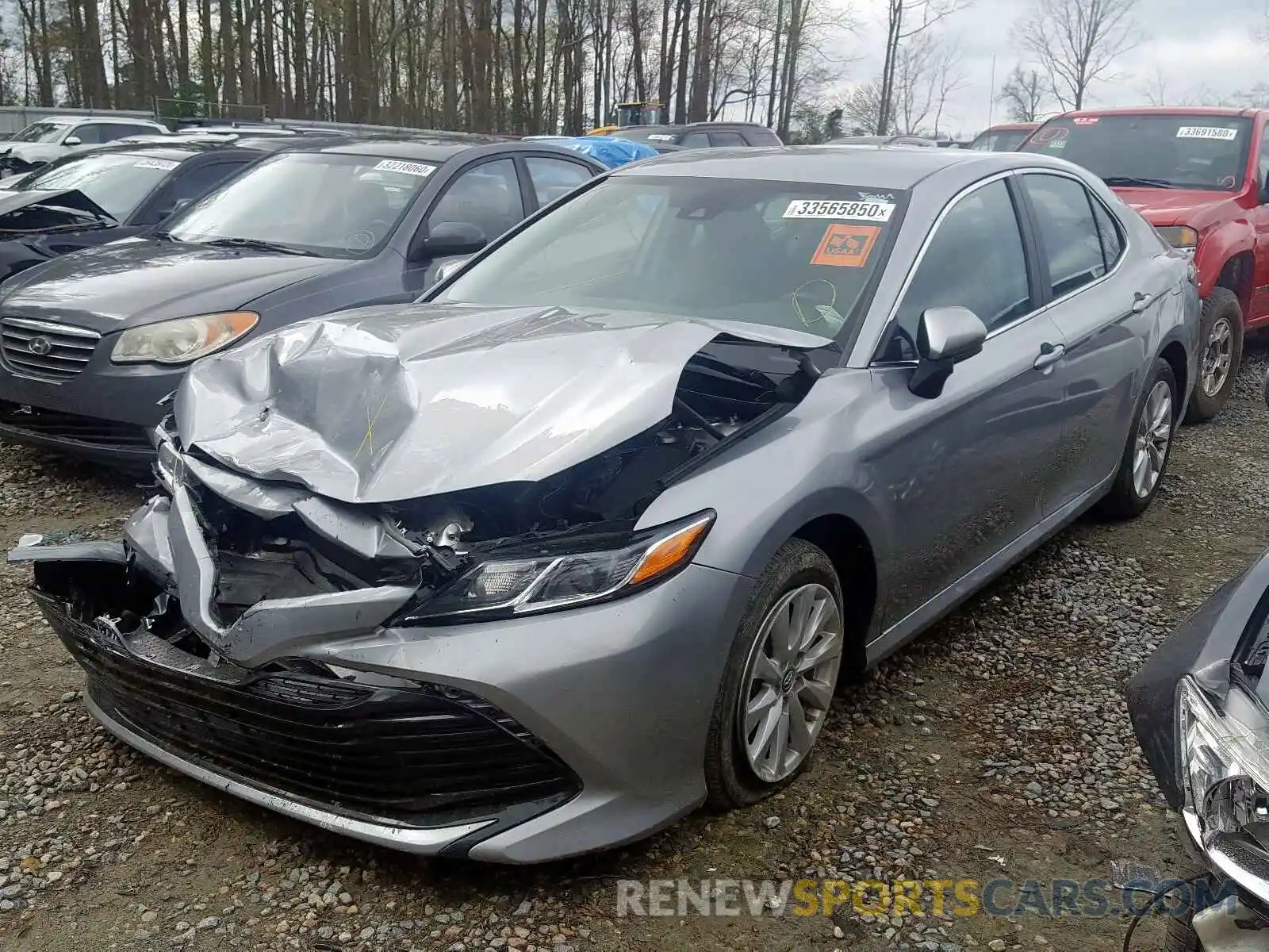 2 Photograph of a damaged car 4T1B11HK6KU243112 TOYOTA CAMRY 2019