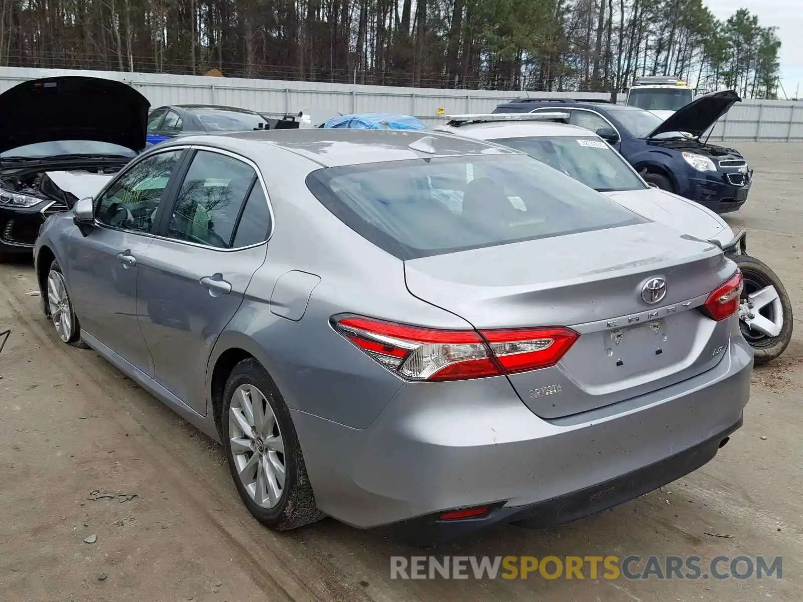 3 Photograph of a damaged car 4T1B11HK6KU243112 TOYOTA CAMRY 2019