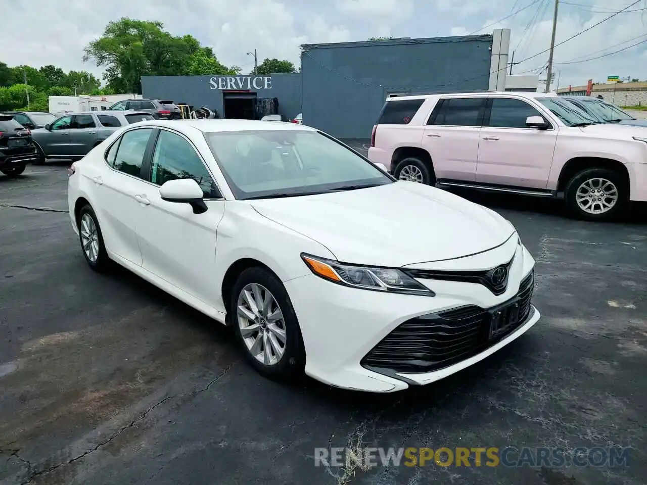 1 Photograph of a damaged car 4T1B11HK6KU243319 TOYOTA CAMRY 2019