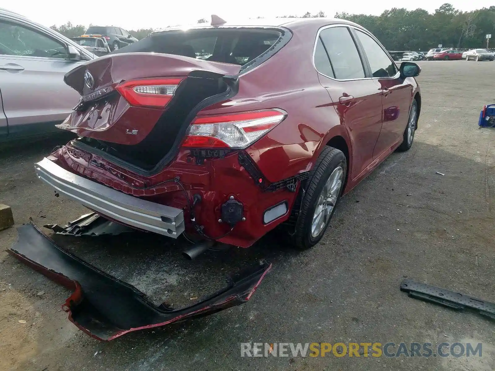 4 Photograph of a damaged car 4T1B11HK6KU245264 TOYOTA CAMRY 2019