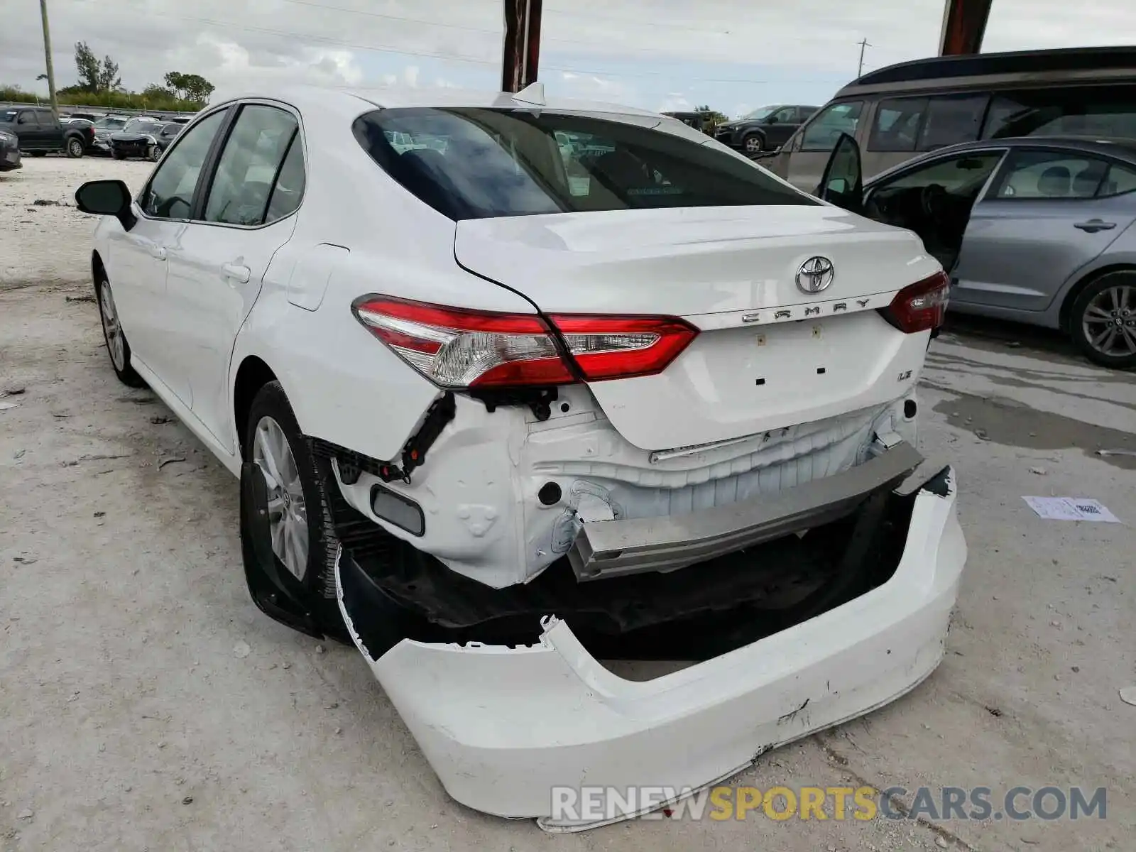 3 Photograph of a damaged car 4T1B11HK6KU251937 TOYOTA CAMRY 2019