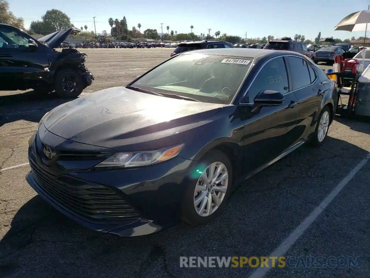 2 Photograph of a damaged car 4T1B11HK6KU254255 TOYOTA CAMRY 2019