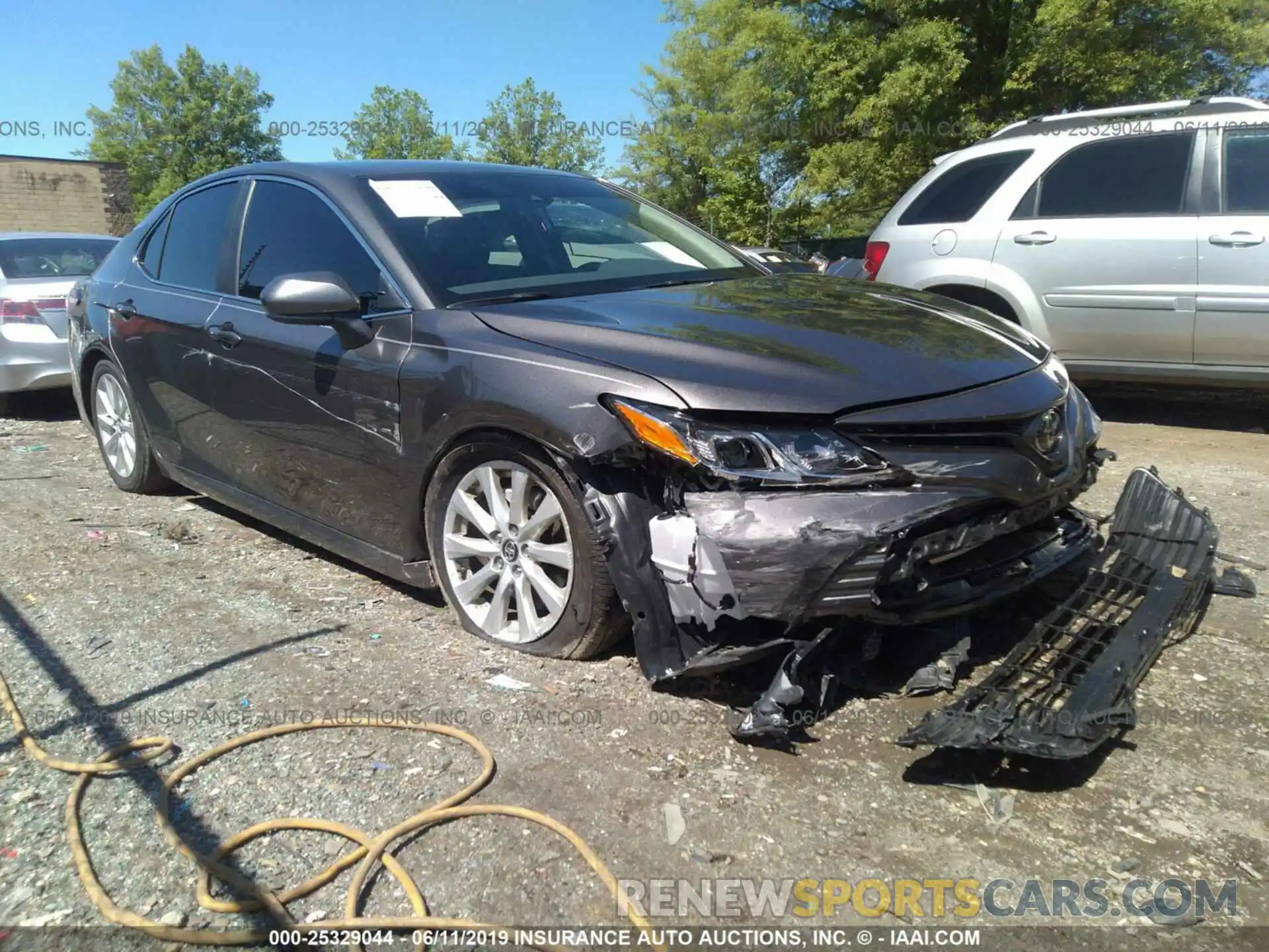 1 Photograph of a damaged car 4T1B11HK6KU254613 TOYOTA CAMRY 2019