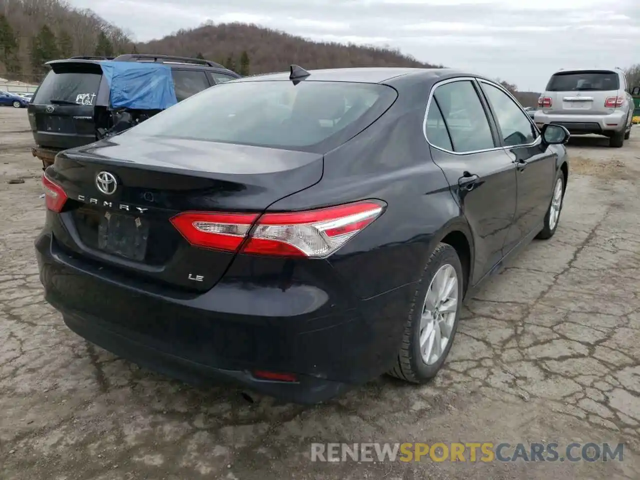 4 Photograph of a damaged car 4T1B11HK6KU257995 TOYOTA CAMRY 2019