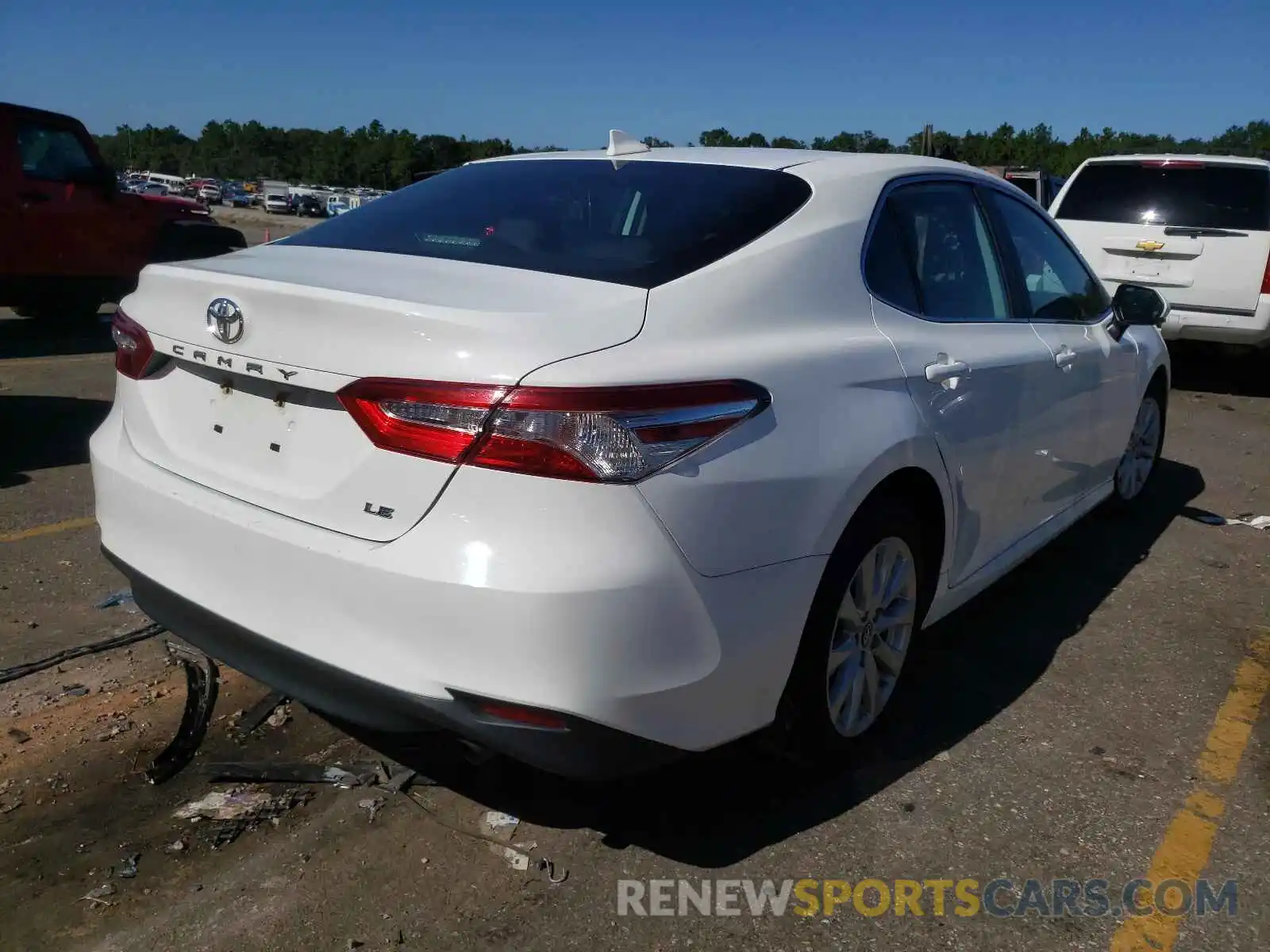 4 Photograph of a damaged car 4T1B11HK6KU258306 TOYOTA CAMRY 2019