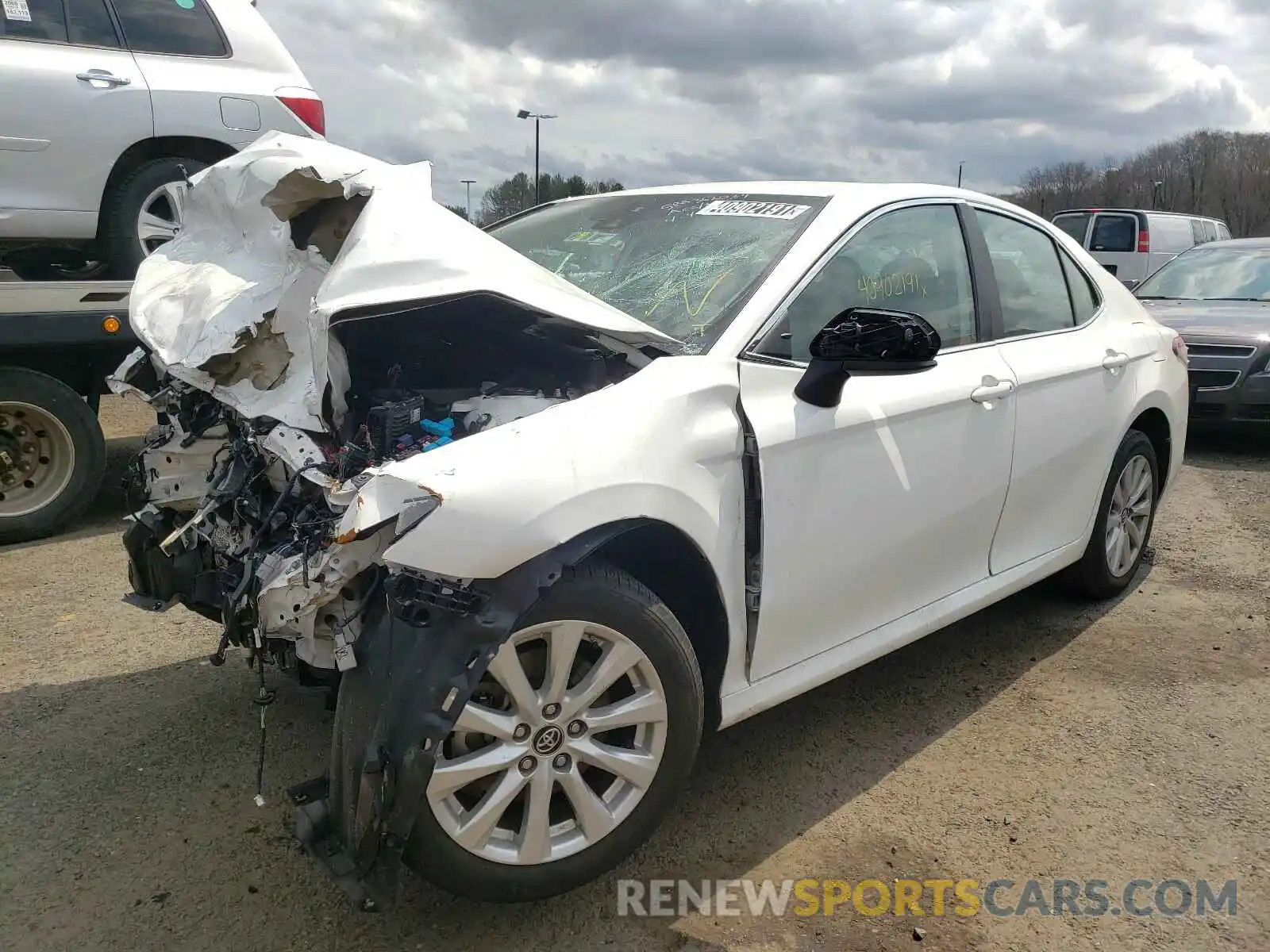 2 Photograph of a damaged car 4T1B11HK6KU258760 TOYOTA CAMRY 2019