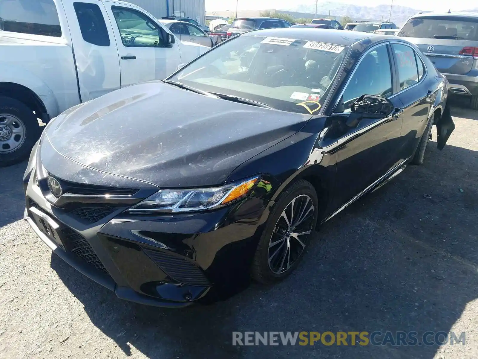 2 Photograph of a damaged car 4T1B11HK6KU264445 TOYOTA CAMRY 2019